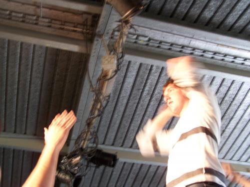 Hands on his head. I took this pic.